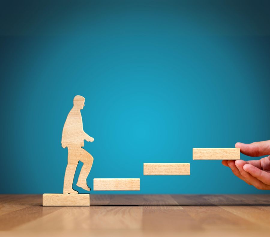 LIfterLMS for coaches man stepping up and helper holding steps